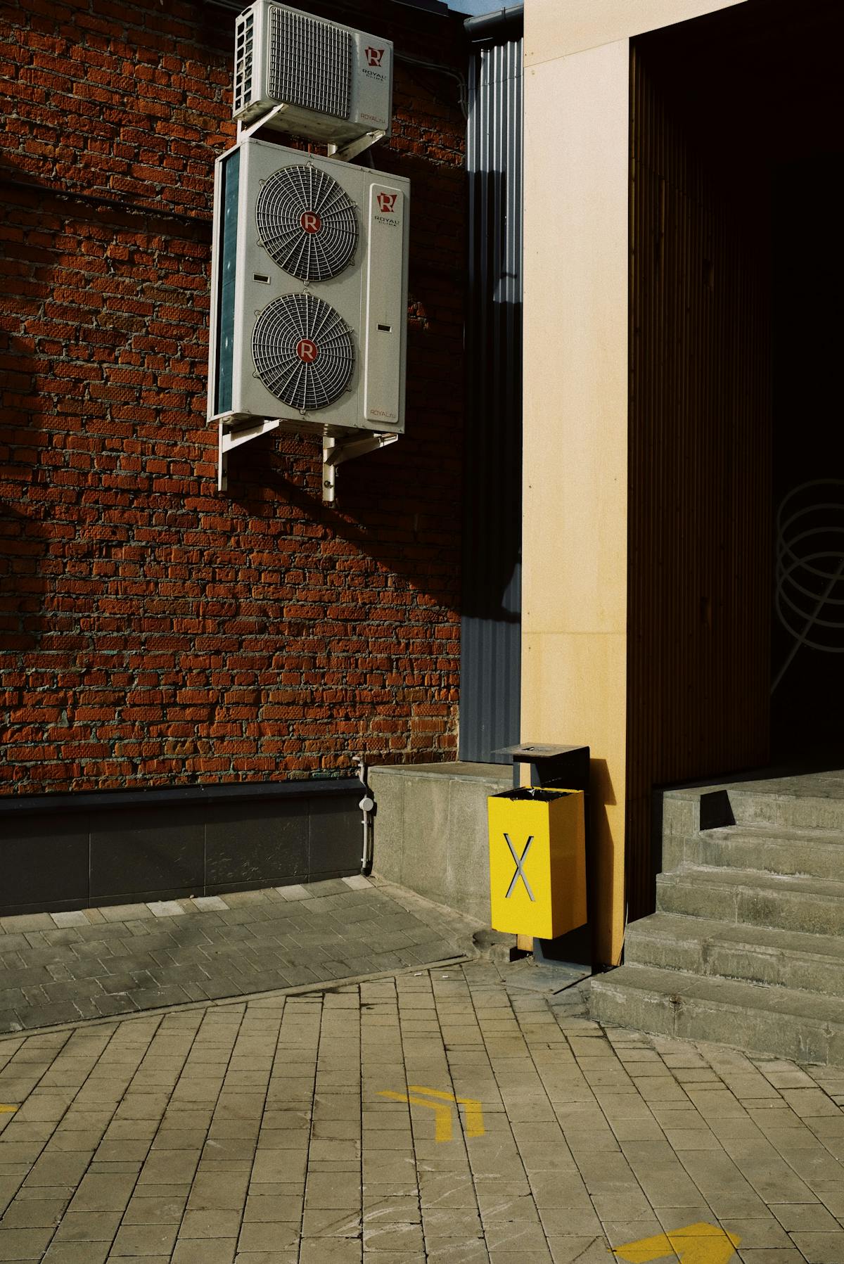 Gas Safe registered engineer servicing a combi boiler as part of a combined CP12 gas safety certificate visit in London