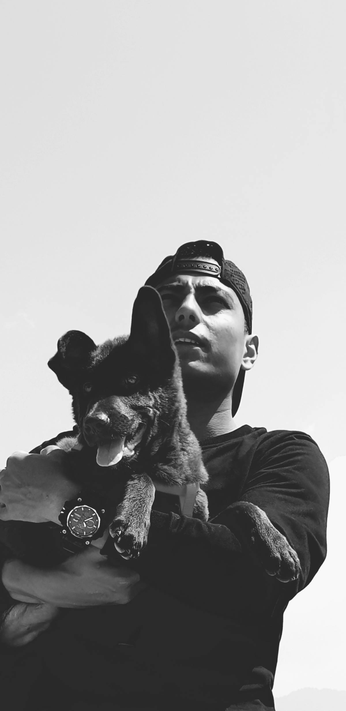 London homeowner photographing water damage for an insurance approved emergency plumber claim